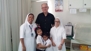 Peter at Gualandi Deaf School with the Head Teacher Sister Susan, Principal Sister Giulia (aged in her 80s) and two young boarder pupils from outlying islands